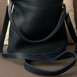 Fantastic, never used,navy blue Kimble International original shoulder handbag.